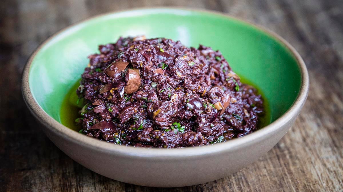 Black Olive Tapenade. A tapenade packed with savory umami flavors, your mozzarella bar would be incomplete without it.